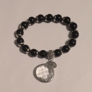Chico’s Black And Silver Beaded Stretch Bracelet with Silver Tone Pendant Charm